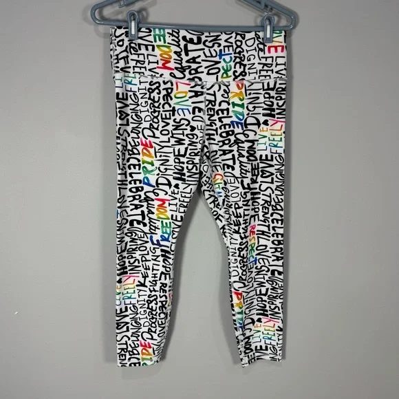 NWOT ATHLETA ELATION TRAIN 7/8
Tight Leggings PRIDE Graffiti words L - Picture 3 of 13